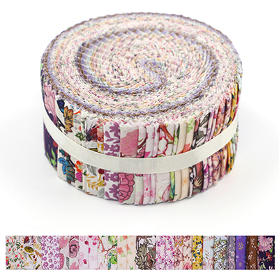 A close-up image of a rolled jelly roll bundle of fabric strips in various colorful floral patterns.