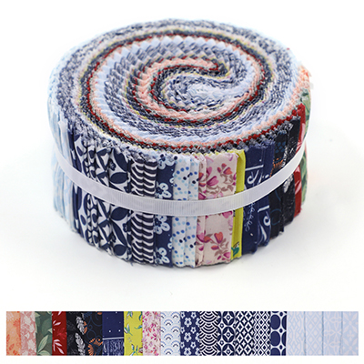 Rolled out jelly roll of fabric strips in various colors with geometric and floral prints.