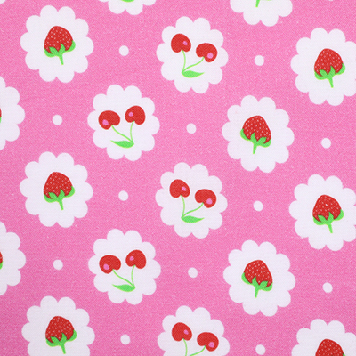 Pink fabric with white polka dots, featuring strawberries and cherries within white scalloped circles.