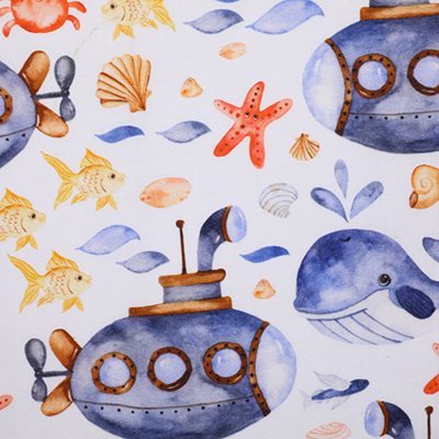 Underwater-themed fabric featuring submarines, whales, starfish, and seashells.